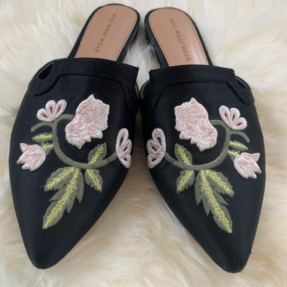 Embroidered satin flat mules.